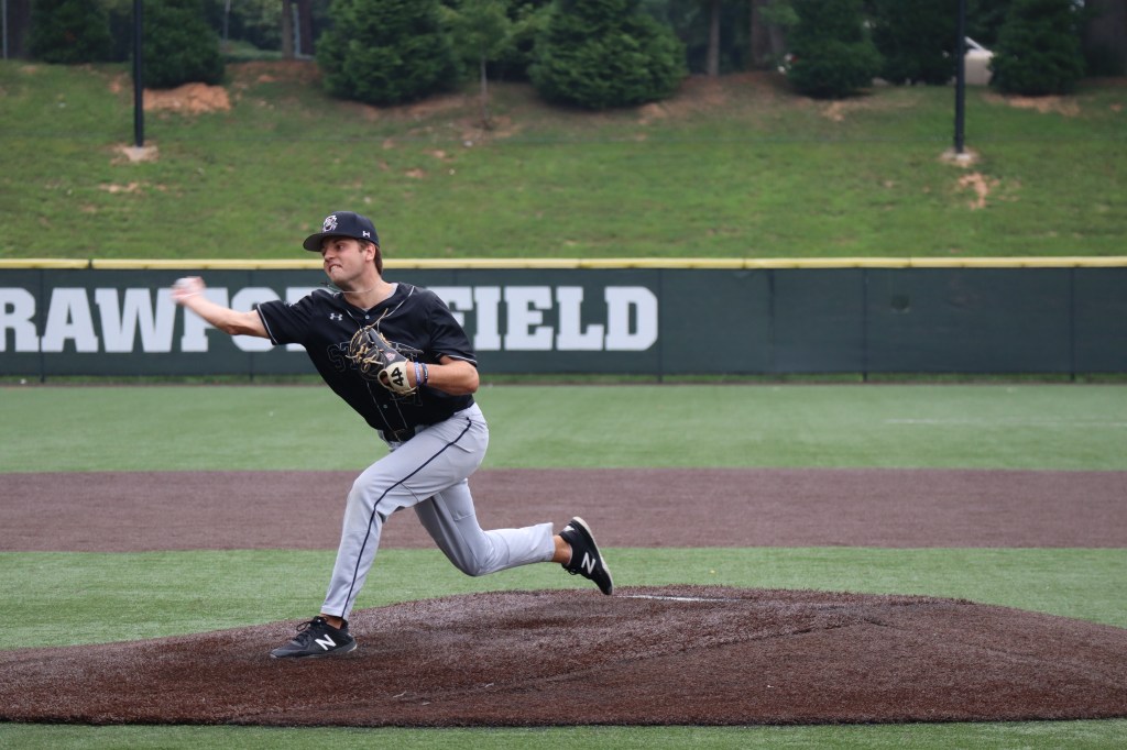 Baseball pitcher throwing a pitch
